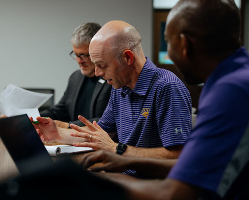 professionals working together at a table