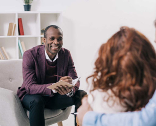 Counselor working with client