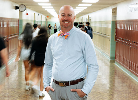 teacher standing in hallway
