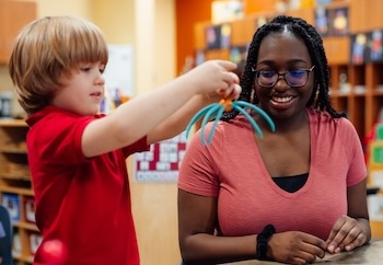 Teacher working with a student