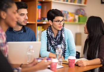 Teacher meeting with international students