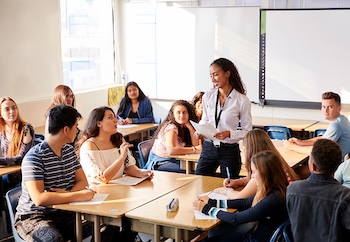 Teacher with students in classroon