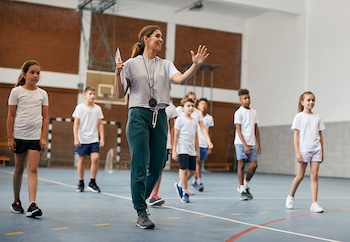 Physical Education teacher and elementary students