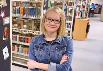 Librarian among the library stacks