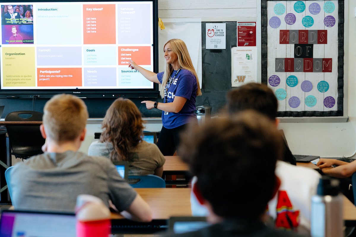 Teacher in a high school classroom