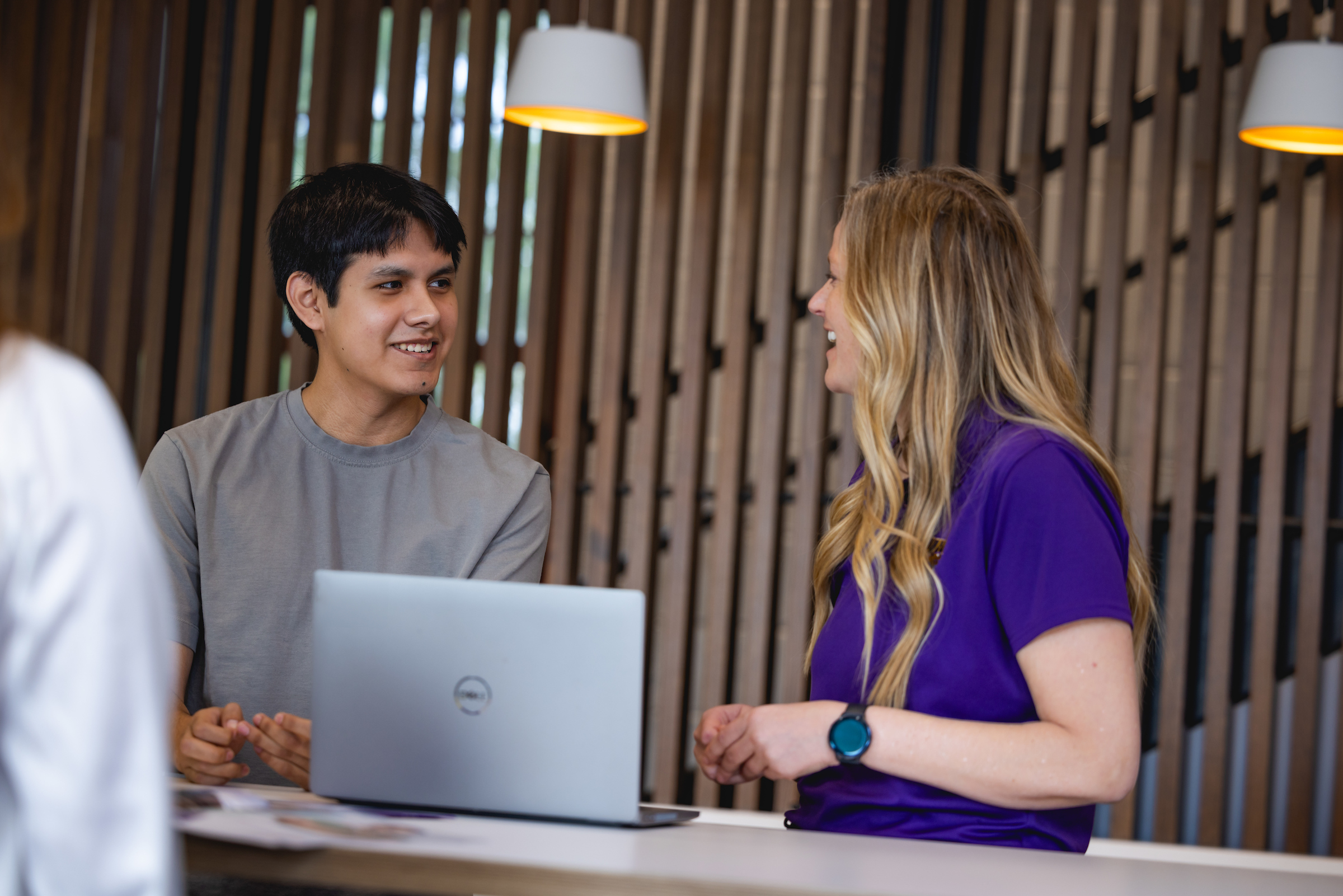 Young employee being taught 