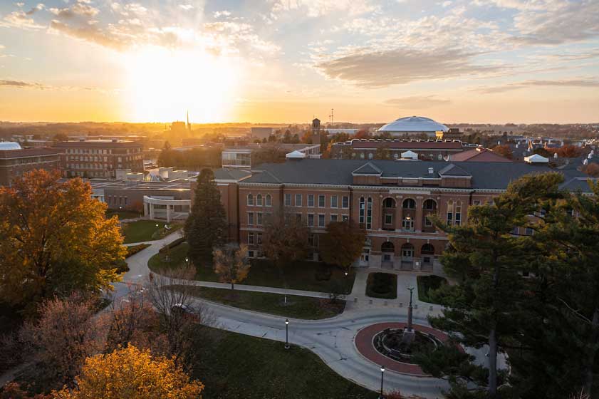 picture of sunrise over UNI's campus in the fall