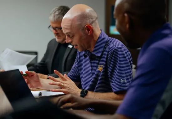 professionals working together at a table