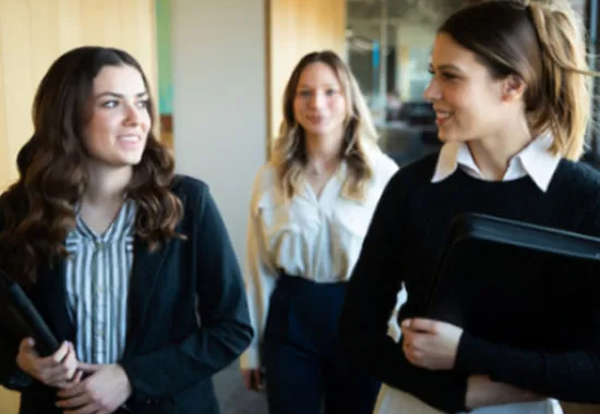 Students talking in hallway.