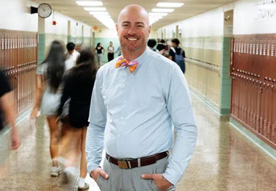 teacher standing in hallway