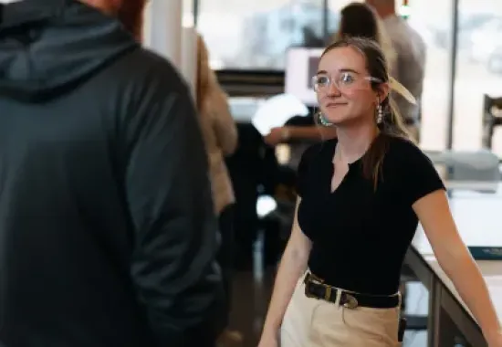 Two people discussing.