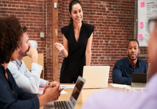 Five people having a business meeting.