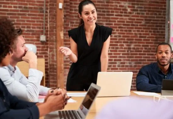Five people having a business meeting.